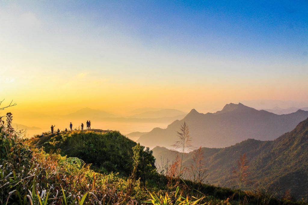 Services Photo Of People Standing On Top Of Mountain Near Grasses 733162 1024x682 1